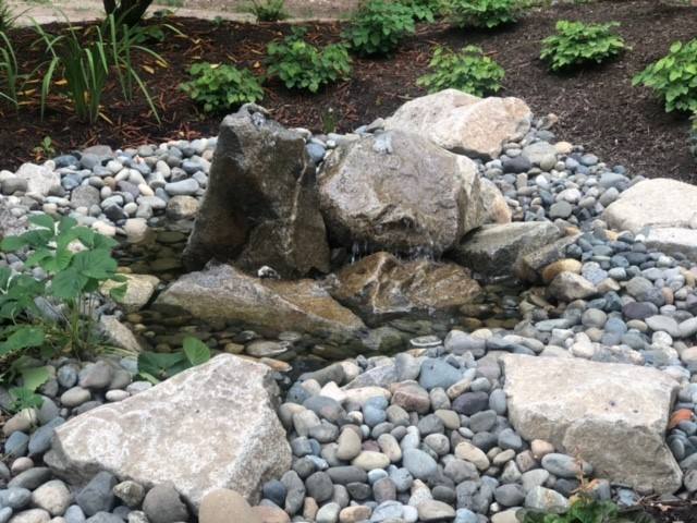 Small natural stone water feature